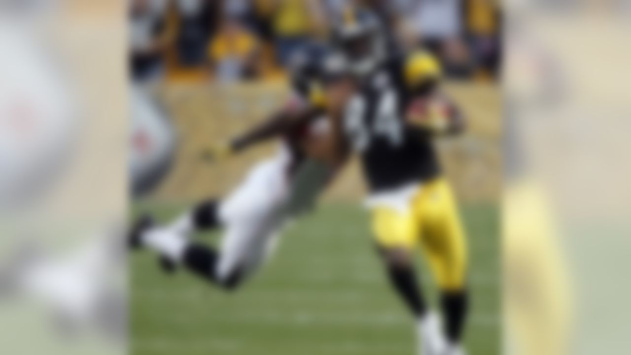 Pittsburgh Steelers kickoff-returner Antonio Brown (84) tries to shake off Atlanta Falcons placekicker Matt Bosher (5) on his return in the first quarter of a preseason NFL football game on Saturday, Aug. 27, 2011, in Pittsburgh. (AP Photo/Keith Srakocic)