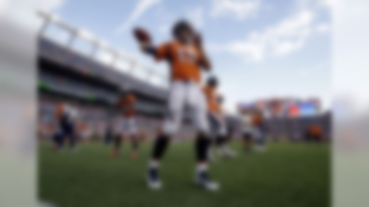 Denver Broncos quarterback Trevor Siemian (13) warms up prior to an NFL preseason football game against the Green Bay Packers, Saturday, Aug. 26, 2017, in Denver. AP Photo/Jack Dempsey)