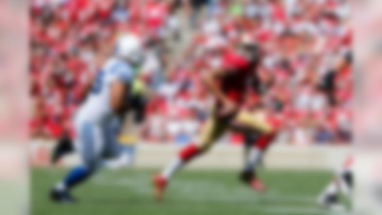 San Francisco 49ers quarterback Colin Kaepernick (7) runs with the ball during the week three NFL game between the Indianapolis Colts and the San Francisco 49ers on Sunday, Sep. 22, 2013 at the Candlestick Park in San Francisco. (Ric Tapia/NFL)