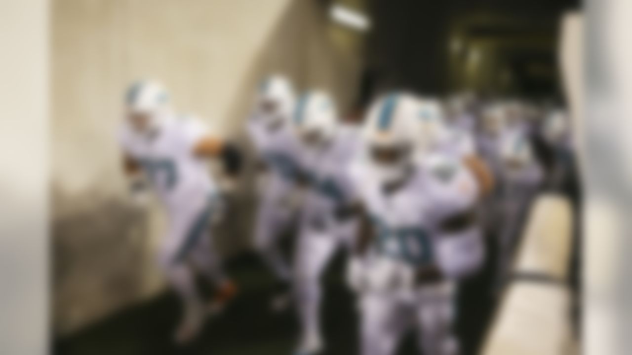 The Miami Dolphins run out of the tunnel prior to a game against the Thursday, Oct. 26, 2017, in Baltimore. (Logan Bowles / NFL)