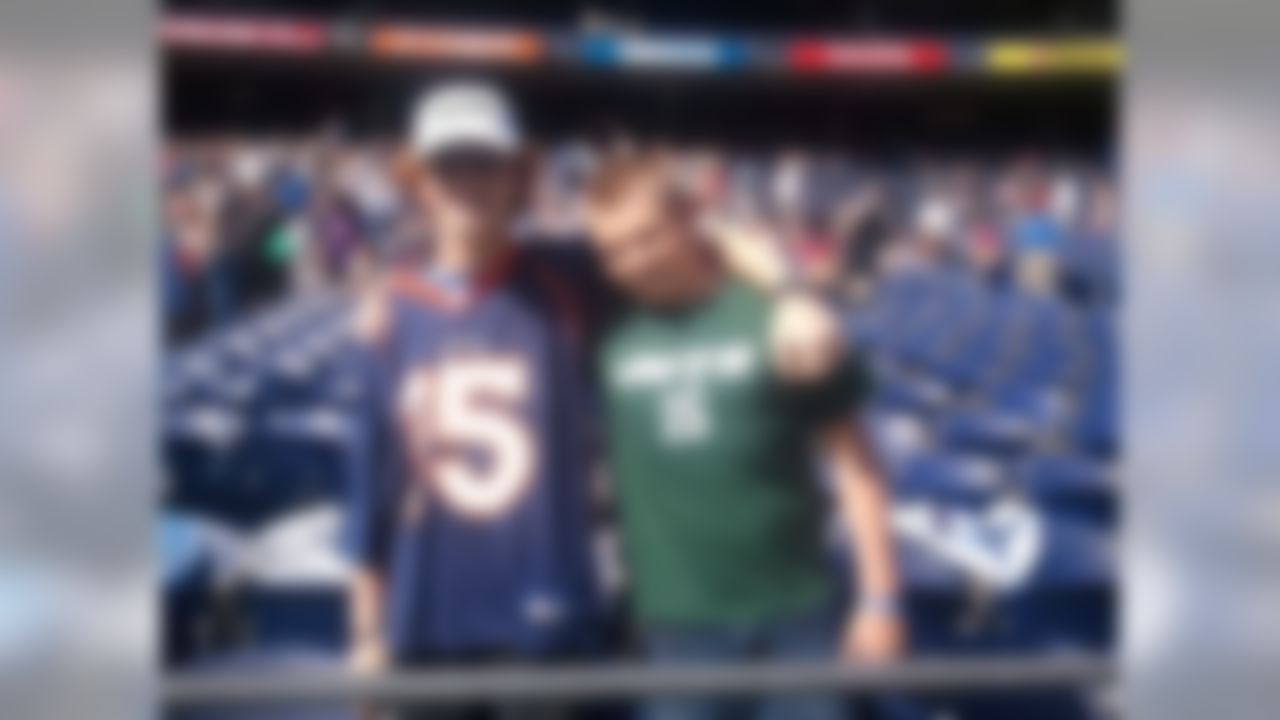 Tim Tebow fans Matthew Shippey and David Zinck pose for a photograph before watching New York Jets quarterback Tim Tebow deliver a sermon at Qualcomm Stadium in San Diego, California on June 17, 2012.  (Kenny Legan/NFL)