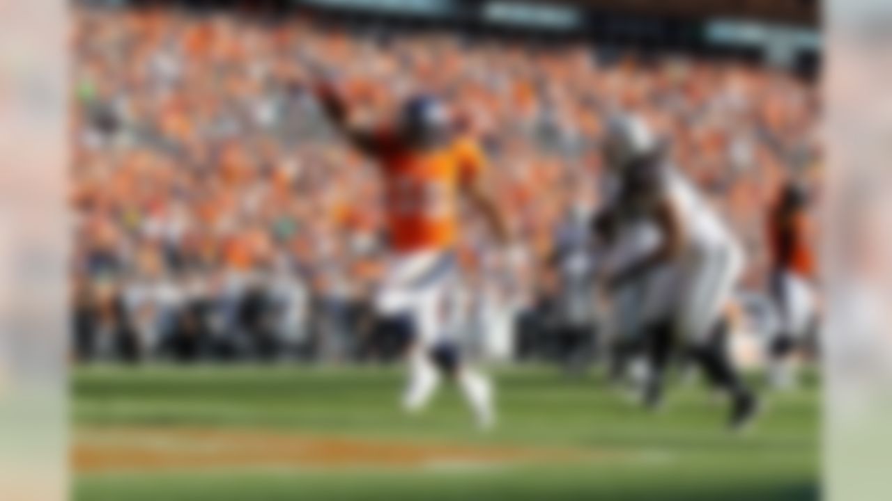 Denver Broncos running back Lance Ball celebrates his touchdown run during the NFL game between the Oakland Raiders and the Denver Broncos at the Sports Authority Field at Mile High in Denver, Colorado on September 30, 2012. (Ric Tapia/NFL)