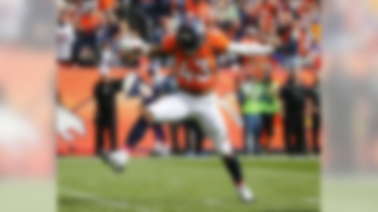 Denver Broncos strong safety T.J. Ward celebrates a sack against the Minnesota Vikings during the first half of an NFL football game, Sunday, Oct. 4, 2015, in Denver. (AP Photo/Jack Dempsey)