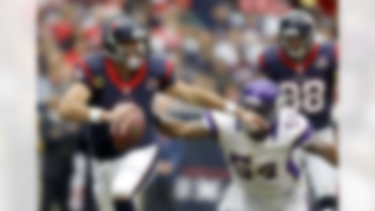 Houston Texans quarterback Matt Schaub (8) is chased out of the pocket by Minnesota Vikings' Jasper Brinkley (54) during the first quarter of an NFL football game on Sunday, Dec. 23, 2012, in Houston. (AP Photo/Patric Schneider)