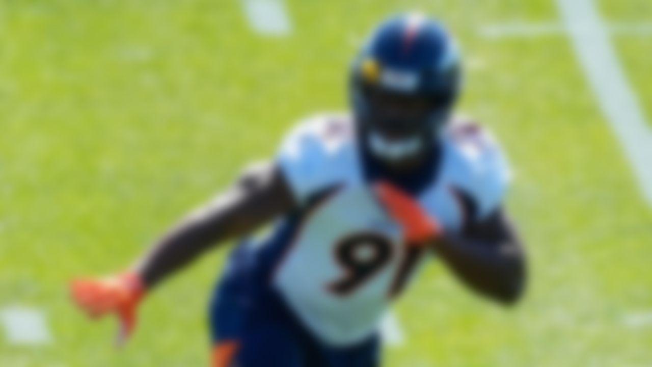 Rookie linebacker Andre Mintze runs a drill during a Denver Broncos OTA on Monday, May 24, 2021, in Englewood, Colo.