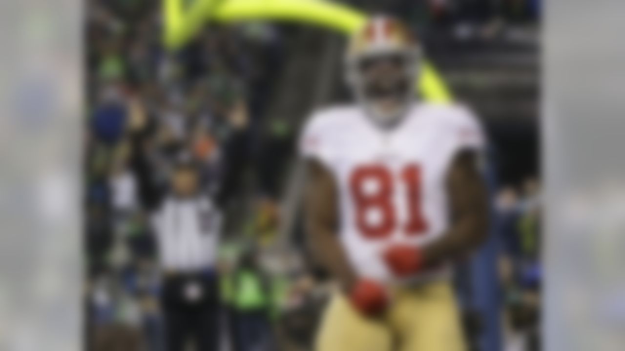 San Francisco 49ers' Anquan Boldin celebrates his touchdown catch during the second half of the NFL football NFC Championship game against the Seattle Seahawks Sunday, Jan. 19, 2014, in Seattle. (AP Photo/Marcio Jose Sanchez)