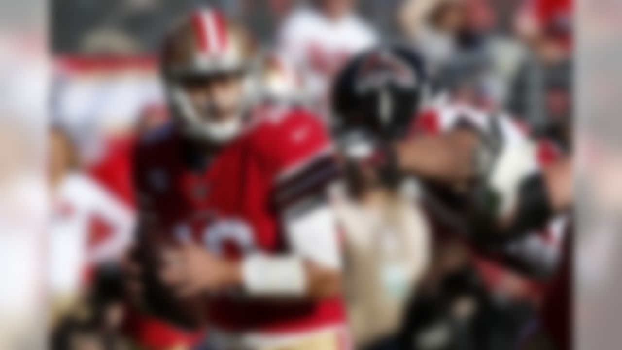 Atlanta Falcons defensive end Vic Beasley, right, reaches to sack San Francisco 49ers quarterback Jimmy Garoppolo during the first half of an NFL football game in Santa Clara, Calif., Sunday, Dec. 15, 2019. (AP Photo/Josie Lepe)