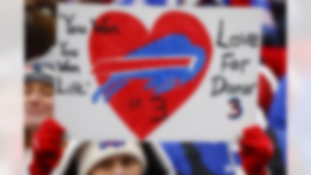 Fans show their support for Buffalo Bills safety Damar Hamlin (3) with signs and costumes during the first half of an NFL football game against the New England Patriots, Sunday, Jan. 8, 2023, in Orchard Park. Hamlin remains hospitalized after suffering a catastrophic on-field collapse in the team's previous game against the Cincinnati Bengals.