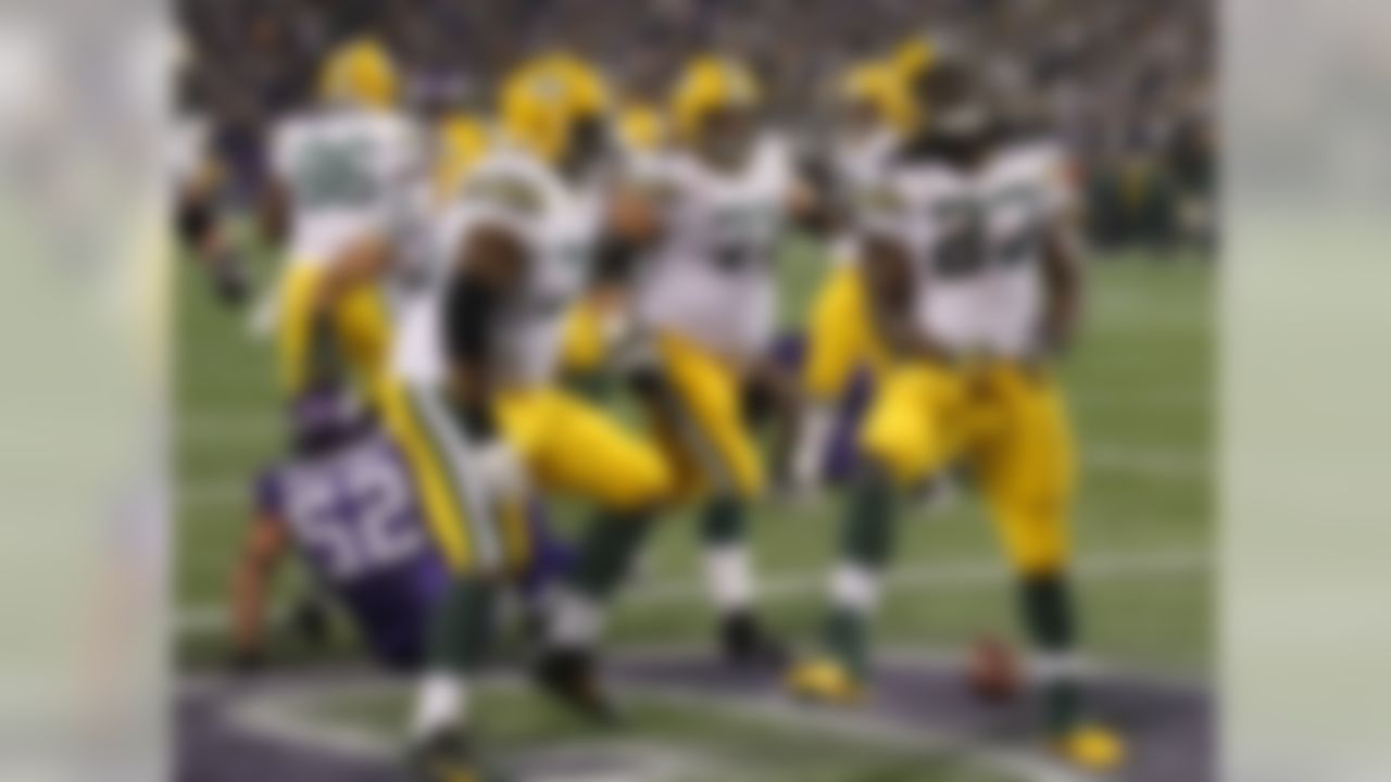 Green Bay Packers running back Eddie Lacy (27) celebrates his touchdown in the second half of an NFL football game against the Minnesota Vikings, Sunday, Oct. 27, 2013, in Minneapolis. (AP Photo/Ann Heisenfelt)