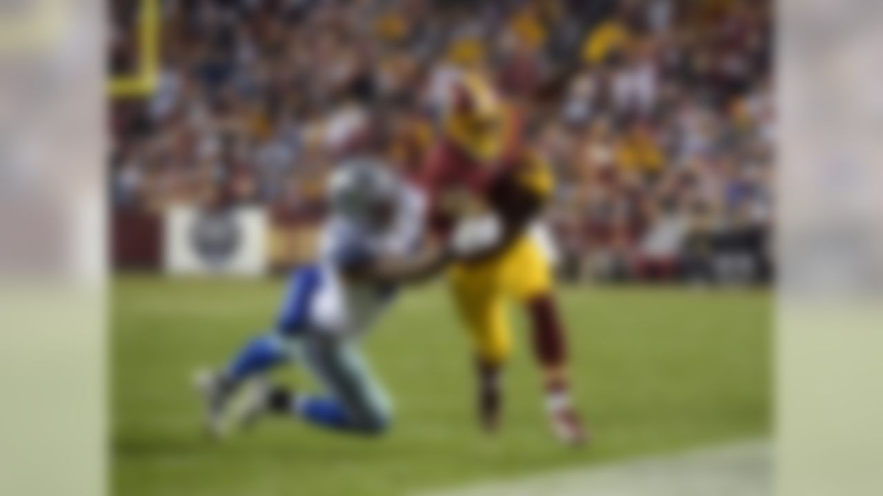 Washington Redskins wide receiver Jamison Crowder (80) is defended by Dallas Cowboys strong safety Barry Church (42) during an NFL football game on Monday, Dec. 7, 2015 in Landover, Md. The Cowboys defeated the Redskins 19-16. (Kirby Lee/NFL)