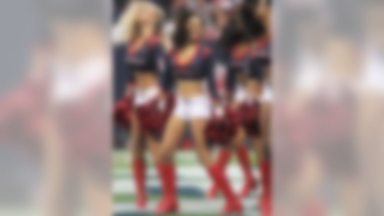 Houston Texans cheerleaders perform during the second quarter of an NFL wild card playoff football game against the Cincinnati Bengals Saturday, Jan. 5, 2013, in Houston. (AP Photo/Patric Schneider)
