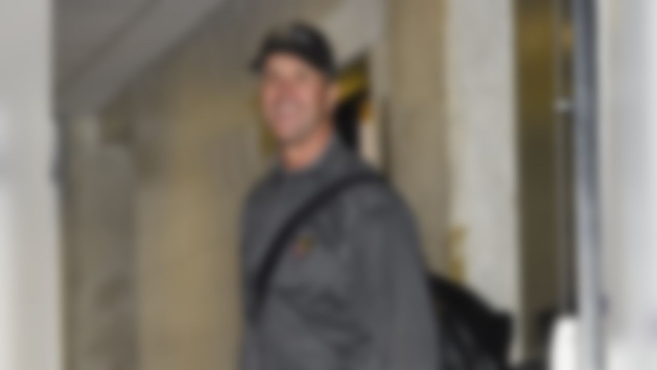 Baltimore Ravens head coach John Harbaugh smiles as he arrives to M&T Bank Stadium for an NFL football game against the San Francisco 49ers, Sunday, Dec. 1, 2019, in Baltimore, Md. (AP Photo/Gail Burton)