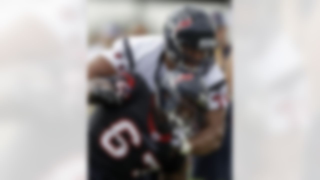 Houston Texans defensive tackle Malcolm Sheppard (67) works against guard Shelley Smith (71) during a NFL football training camp practice Saturday, July 31, 2010 in Houston. (AP Photo/David J. Phillip)