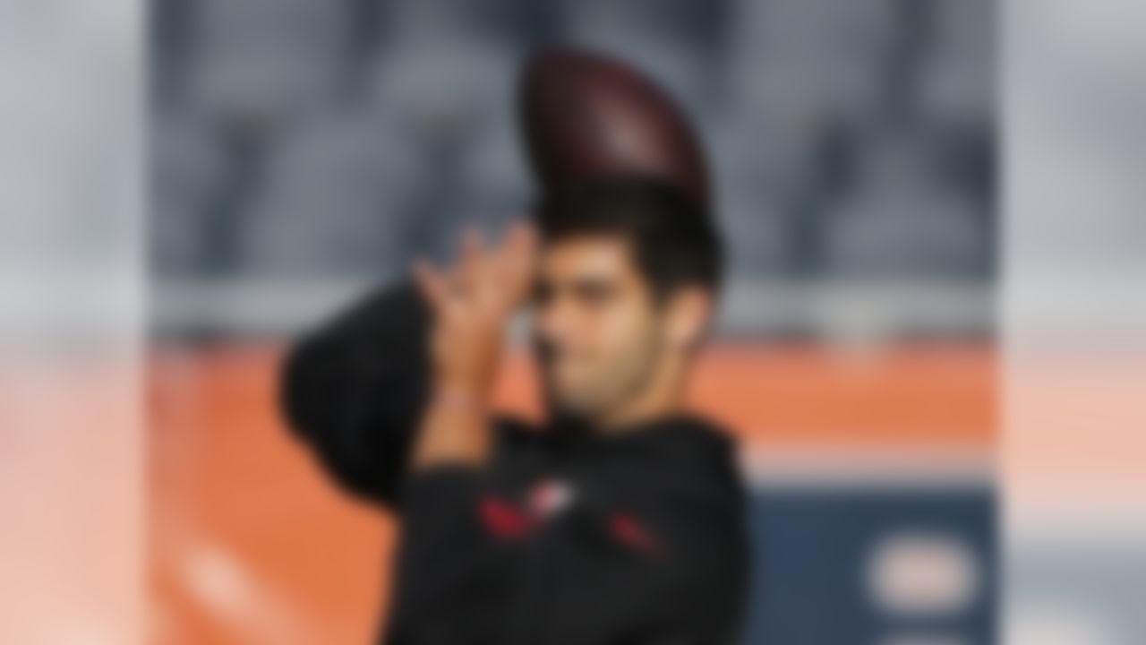 San Francisco 49ers quarterback Jimmy Garoppolo warms up before an NFL football game against the Chicago Bears, Sunday, Dec. 3, 2017, in Chicago. (AP Photo/Charles Rex Arbogast)