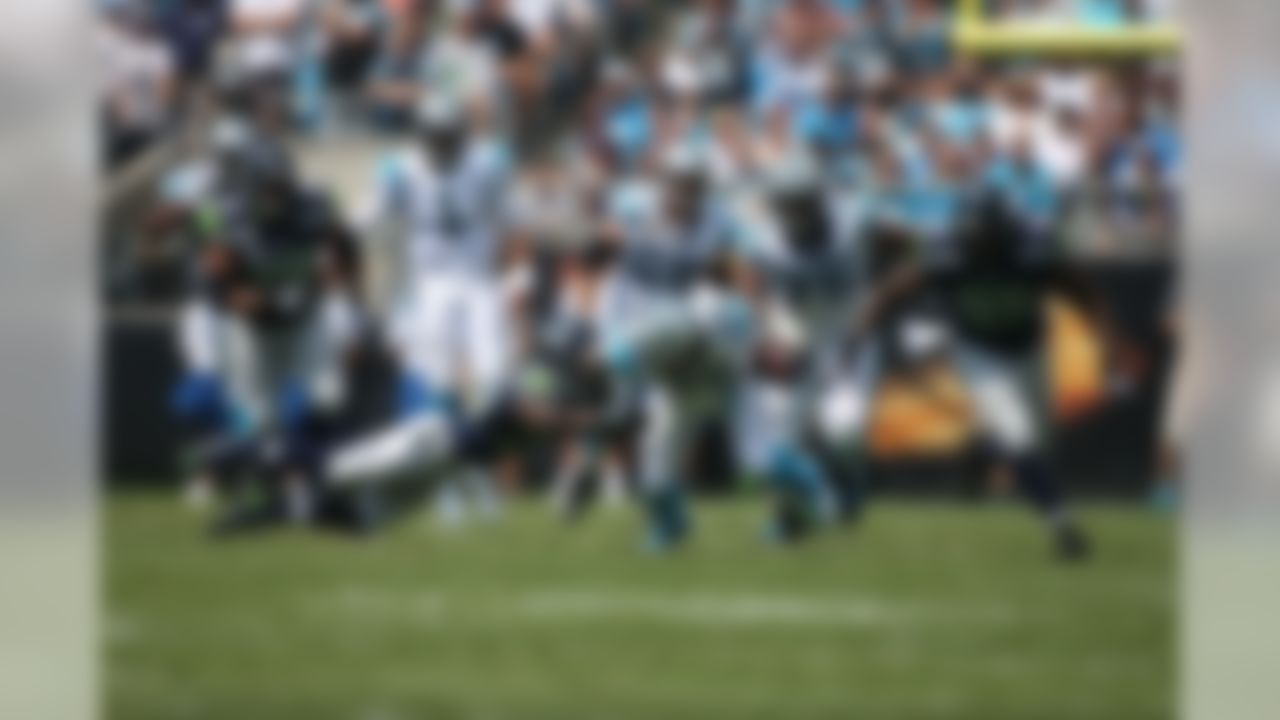 Seattle Seahawks wide receiver Doug Baldwin #89 runs with the football against the Carolina Panthers during an NFL football game on Sunday, Sept. 8, 2013 in Charlotte, North Carolina. (Perry Knotts/NFL)