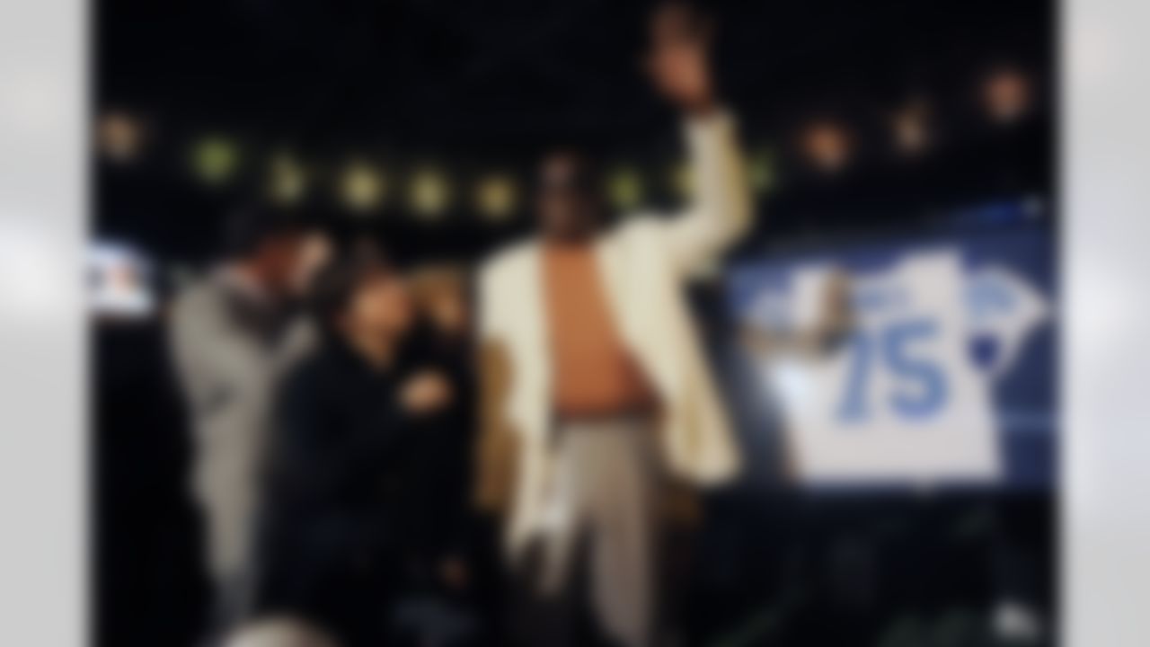 Former Rams player and NFL hall of fame member Deacon Jones waves to the crowd as his number is retired prior to a game between the St. Louis Rams and Green Bay Packers at the Edward Jones Dome on September 27, 2009 in St. Louis, Missouri. (AP Photo/G. Newman Lowrance)