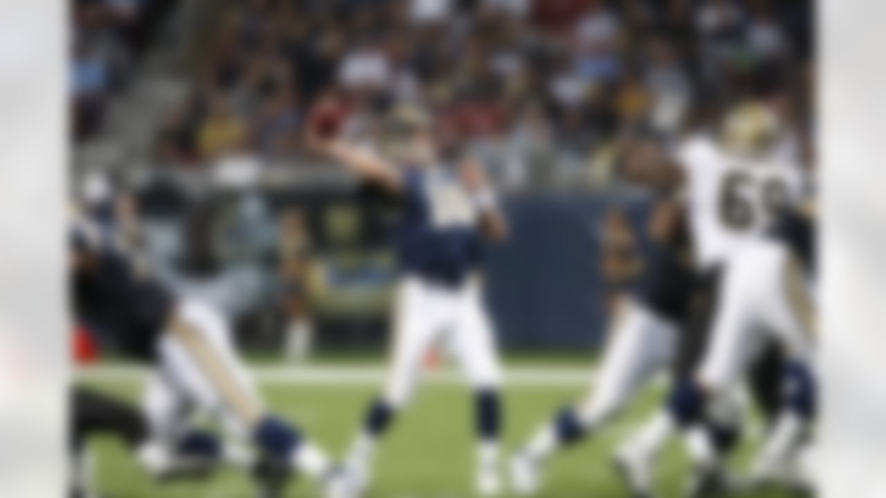 St. Louis Rams' Marc Bulger sets to pass during the second quarter of an NFL football game against the New Orleans Saints Sunday, Nov. 15, 2009, in St. Louis. (AP Photo/Tom Gannam)