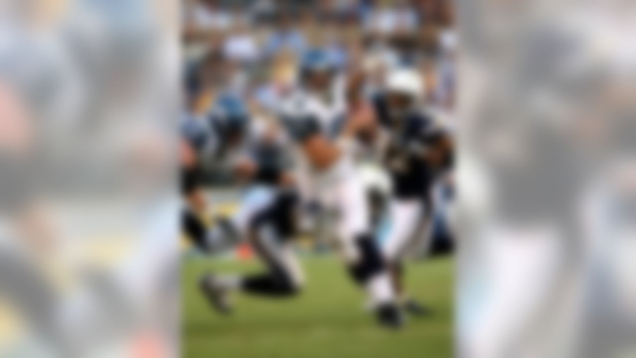 SAN DIEGO - AUGUST 25:  Quarterback Charlie Frye #5 of the Seattle Seahawks scrambles with the ball against the San Diego Chargers on August 25, 2008 at Qualcomm Stadium in San Diego, California.  The Chargers won 18-17.  (Photo by Stephen Dunn/Getty Images)