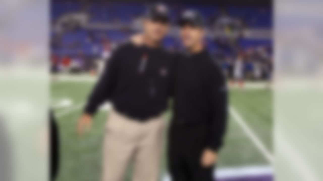 San Francisco 49ers head coach Jim Harbaugh and Baltimore Ravens head coach John Harbaugh prior to an NFL football game at M&T Bank Stadium in Baltimore, Thursday, Nov. 24, 2011. (Ben Liebenberg/NFL)