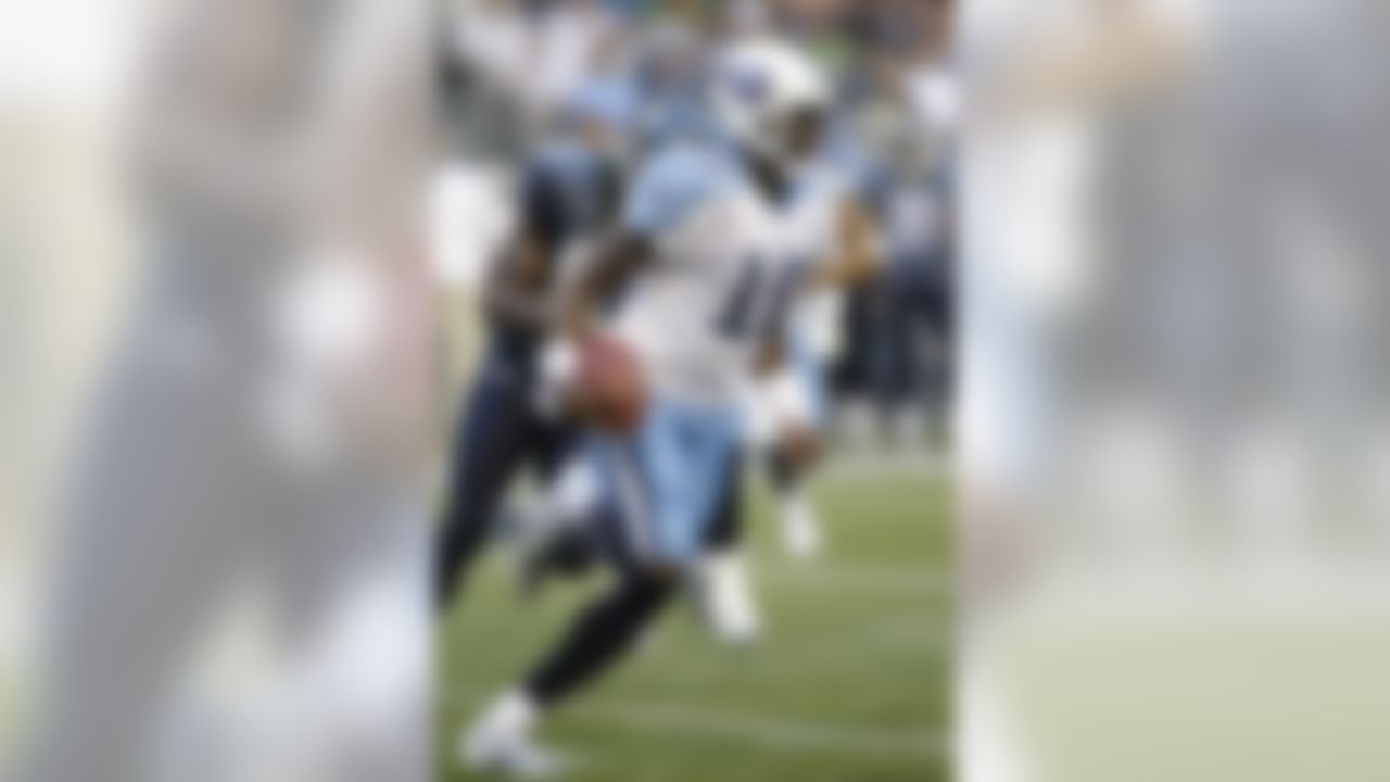 Tennessee Titans' Vince Young in action against the Seattle Seahawks in the first half of an NFL preseason game, Saturday, Aug. 14, 2010, in Seattle. (AP Photo/Ted S. Warren)