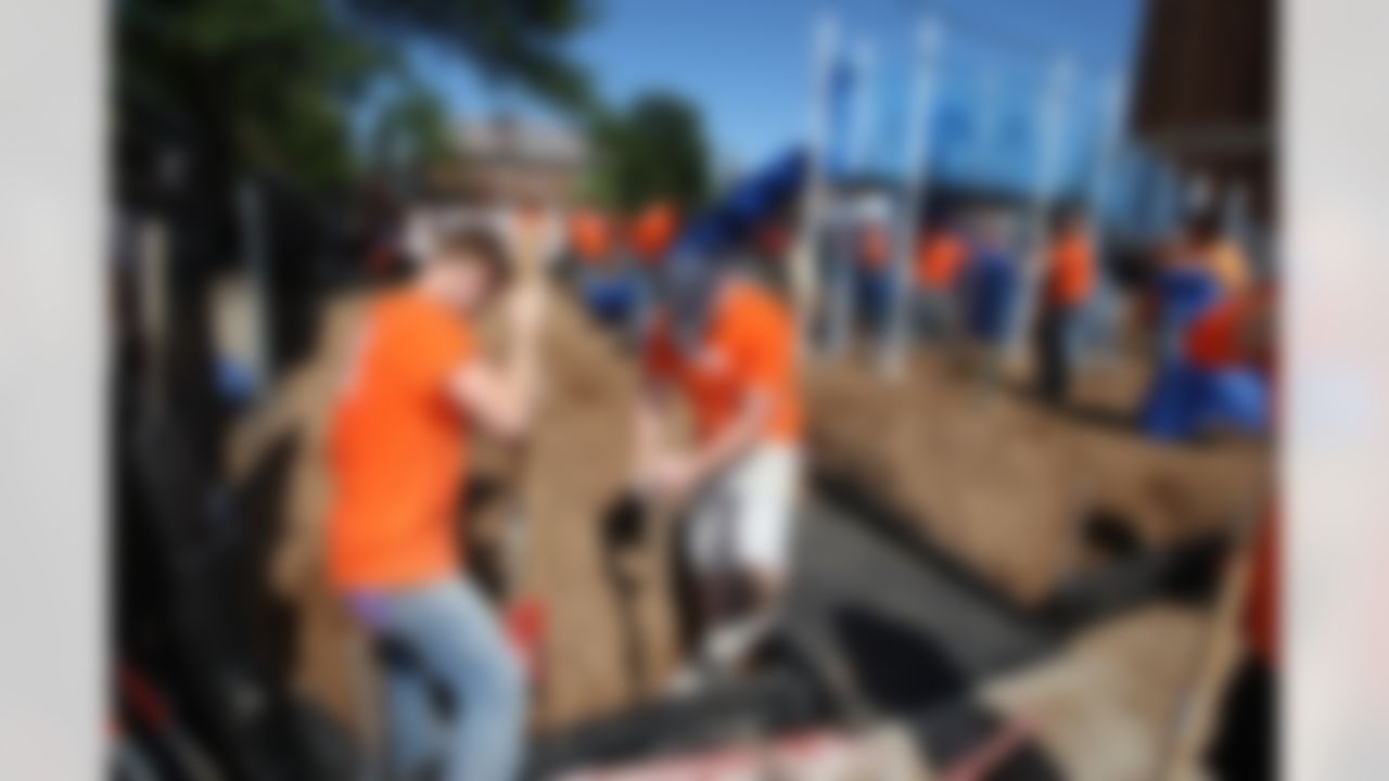 The Home Depot associates building the foundation for the new playground. (Photo by Tom Copeland/Home Depot)