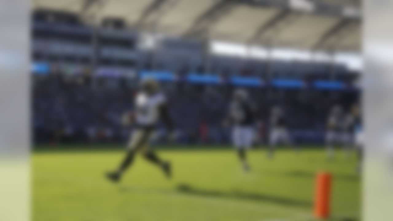 New Orleans Saints running back Alvin Kamara (41) scores a touchdown during an NFL preseason football game, Sunday, Aug. 20, 2017, in Carson, Calif. The Saints defeated the Chargers 13-7. (Ryan Kang/NFL)