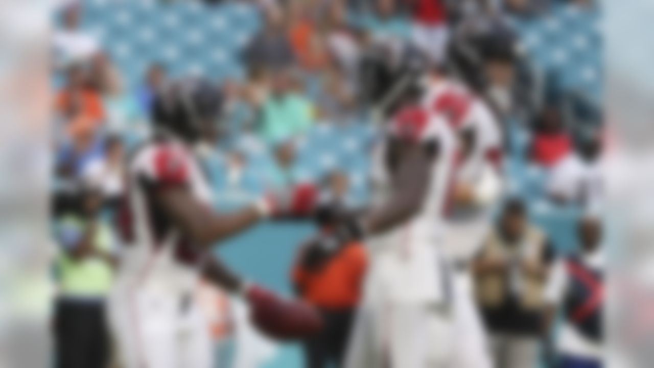 Atlanta Falcons running back Devonta Freeman (24) celebrates after scoring a touchdown against the Miami Dolphins on Thursday, Aug. 10th, 2017, in Miami Gardens, Fla. (Logan Bowles / NFL)