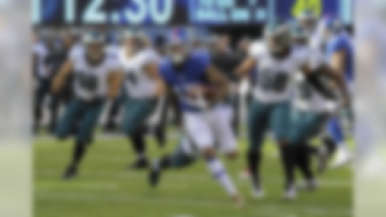 New York Giants wide receiver Odell Beckham Jr. (13) takes the ball up field for a touchdown against the Philadelphia Eagles during the first quarter of an NFL football game, Sunday, Nov. 6, 2016, in East Rutherford, N.J. (AP Photo/Bill Kostroun)