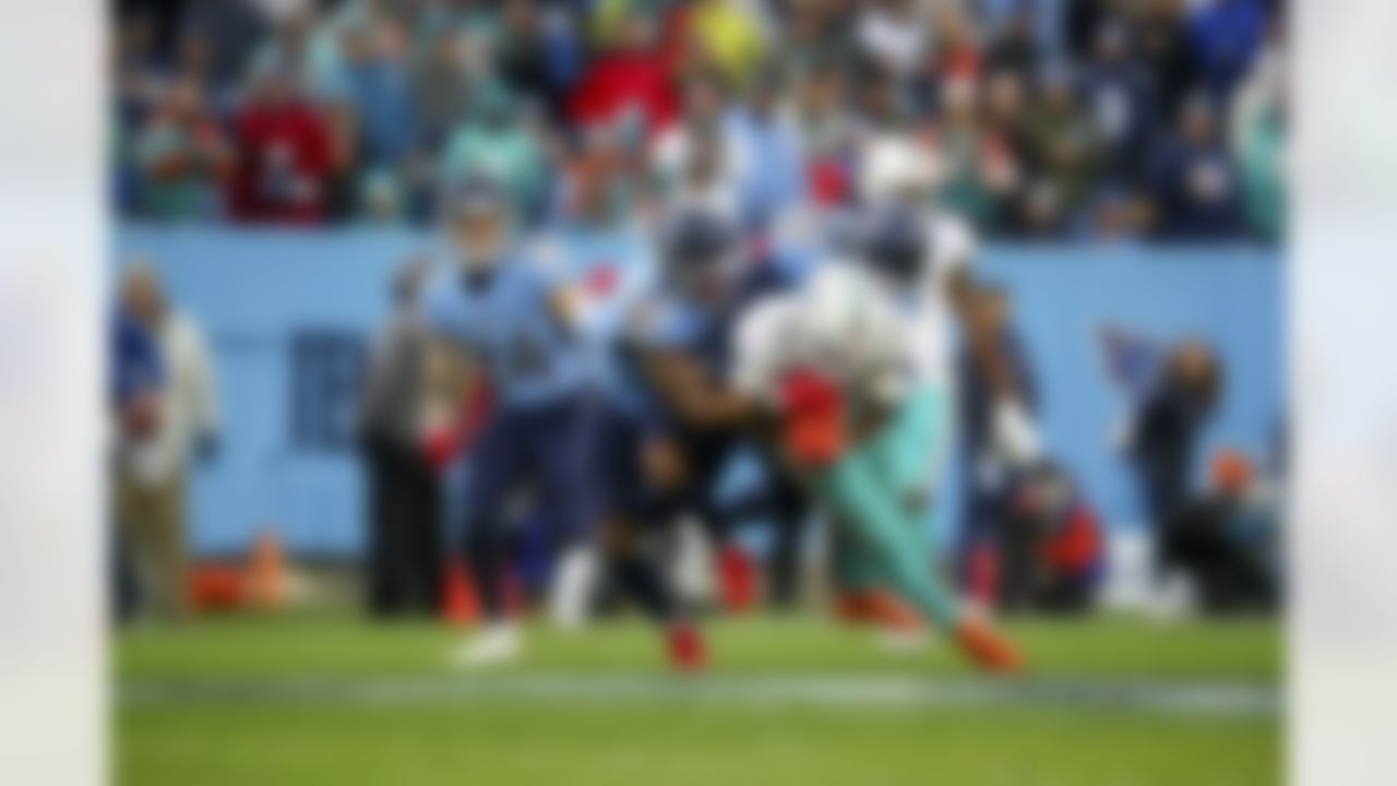Miami Dolphins running back Duke Johnson (28) runs with the ball during an NFL football game against the Tennessee Titans on Sunday, January 2, 2022 in Nashville, Tennessee.