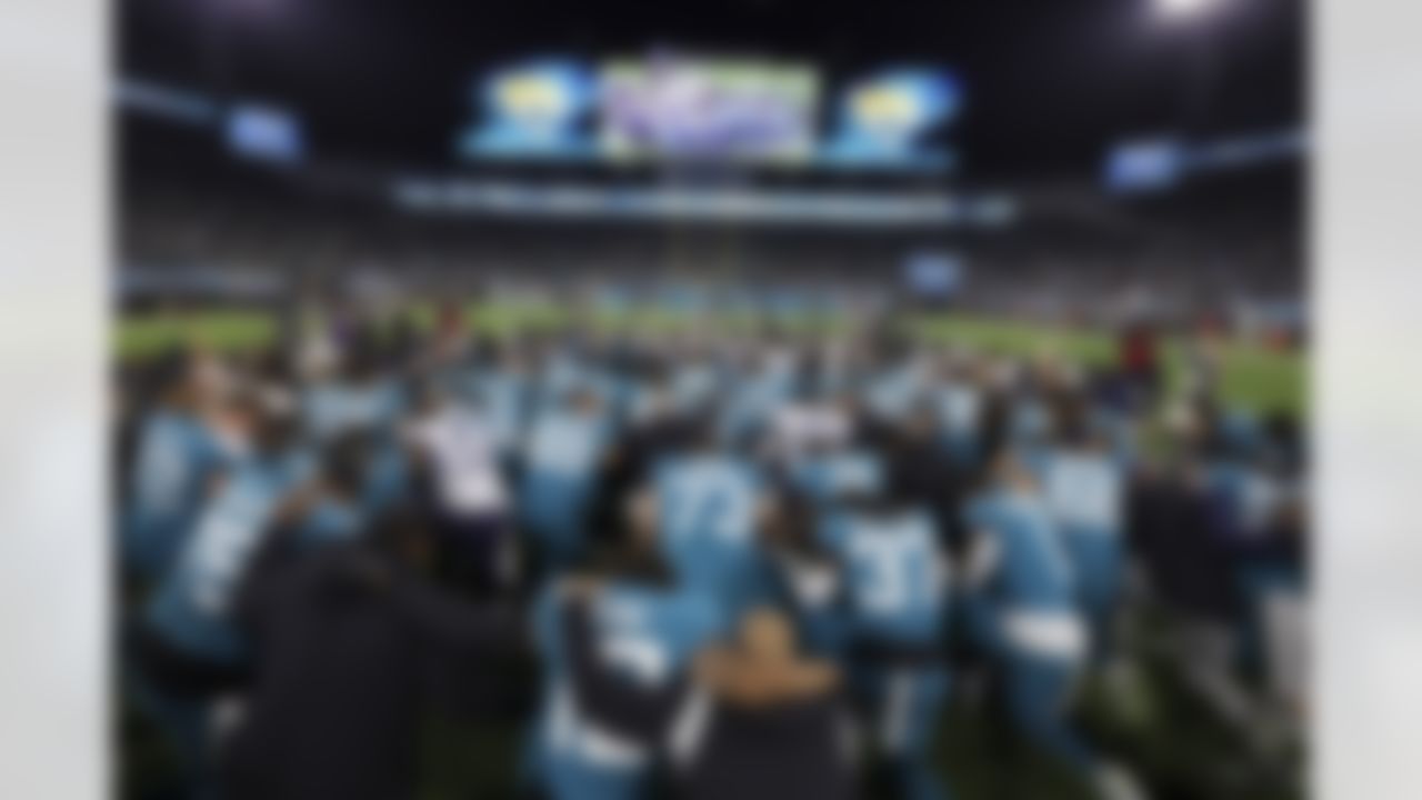 The Jacksonville Jaguars and the Tennessee Titans gather at center field to join in prayer prior to an NFL football game on Saturday, January 7, 2023 in Jacksonville, Florida.