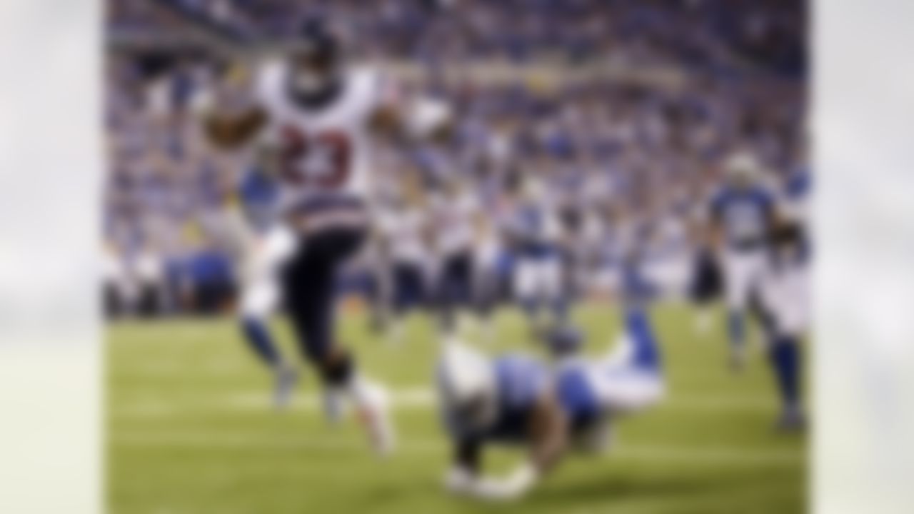 Houston Texans running back Arian Foster (23) gets past the Houston Texans middle linebacker Jeff Tarpinian during the second half of an NFL football game in Indianapolis on Dec. 14, 2014. (AP Photo/AJ Mast)