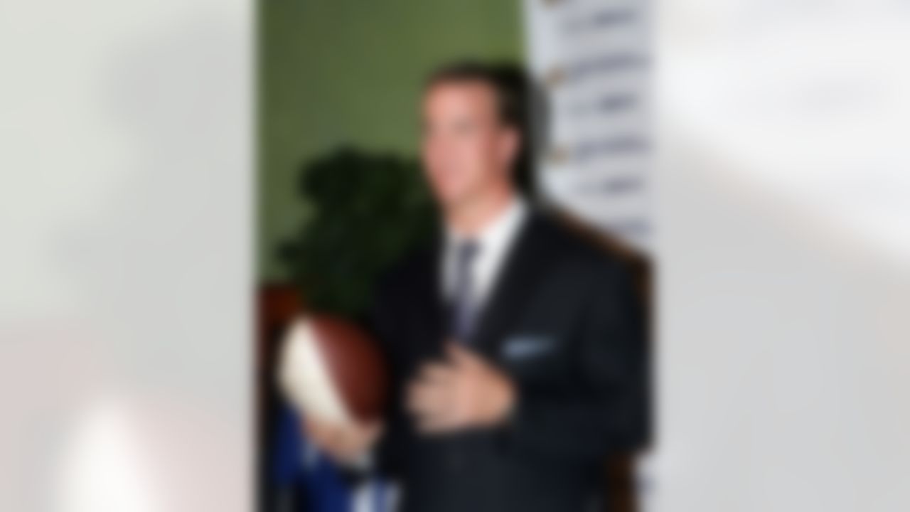 NEW YORK - MARCH 16: Peyton Manning talks to the media at a reception celebrating his 3-Year multi-million dollar exclusive deal with Image Innovations Sports and Entertainment at BLVD March 16, 2005 in New York City. (Photo by Bruce Bennett/Getty Images)