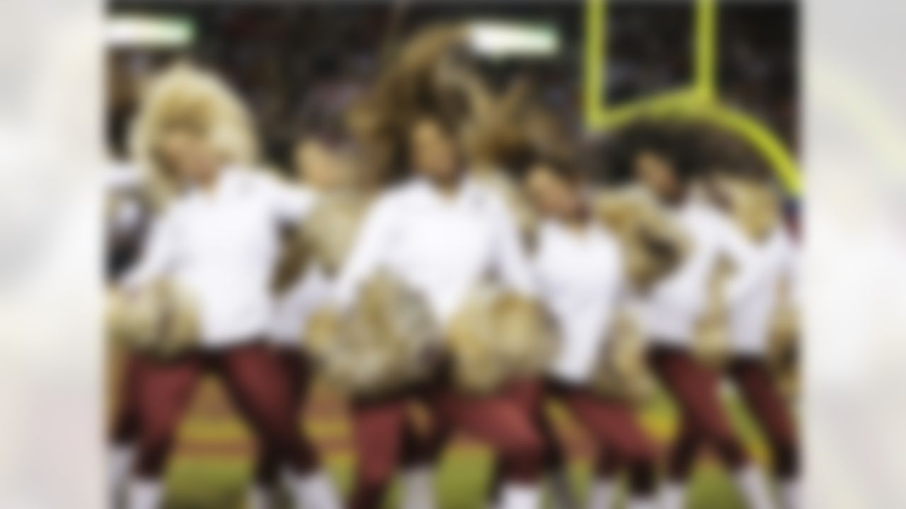 The Washington Redskins cheerleaders perform during the second half of an NFL wild card playoff football game against the Seattle Seahawks in Landover, Md., Sunday, Jan. 6, 2013. (AP Photo/Evan Vucci)