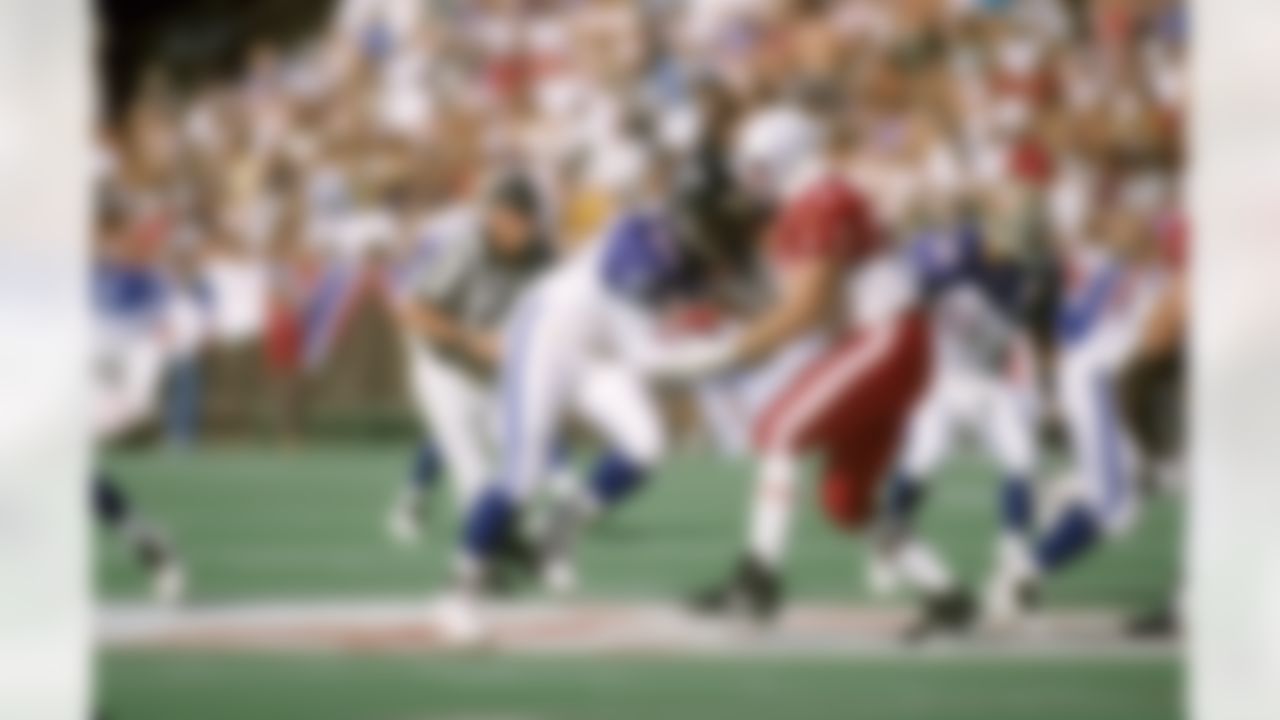 Indianapolis Colts tackle Will Woolford (67) blocks Atlanta Falcons defensive end Chris Doleman (56) during the NFL Pro Bowl, a 20-13 NFC victory on February 4, 1996, at Aloha Stadium in Honolulu, Hawaii. (AP Photo/NFL Photos)