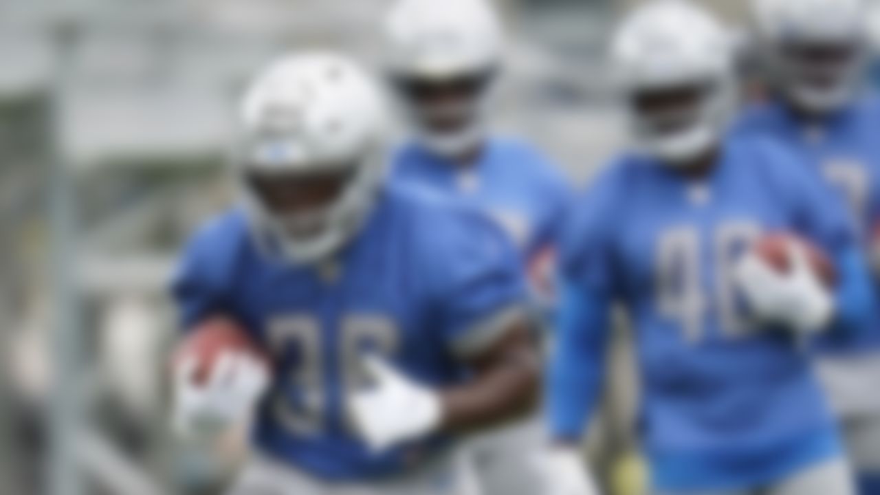 Detroit Lions running back Dedrick Mills (36) runs the ball during an NFL football practice in Allen Park, Mich., Thursday, June 10, 2021.