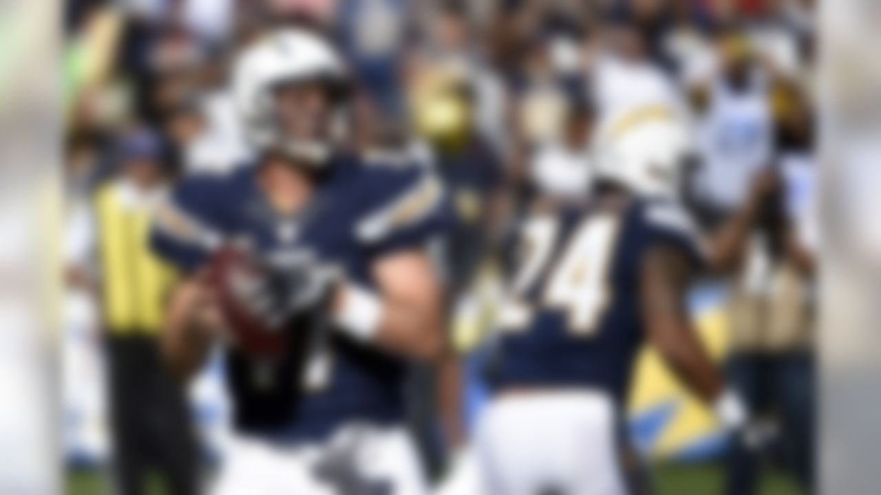 San Diego Chargers quarterback Philip Rivers prepares to throw against the St. Louis Rams during the first half of an NFL football game Sunday, Nov. 23, 2014, in San Diego. (AP Photo/Denis Poroy)