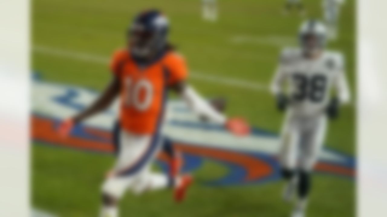 Denver Broncos wide receiver Jerry Jeudy (10) celebrates after scoring a 92-yard touchdown against the Las Vegas Raiders during the second half of an NFL football game, Sunday, Jan. 3, 2021, in Denver.