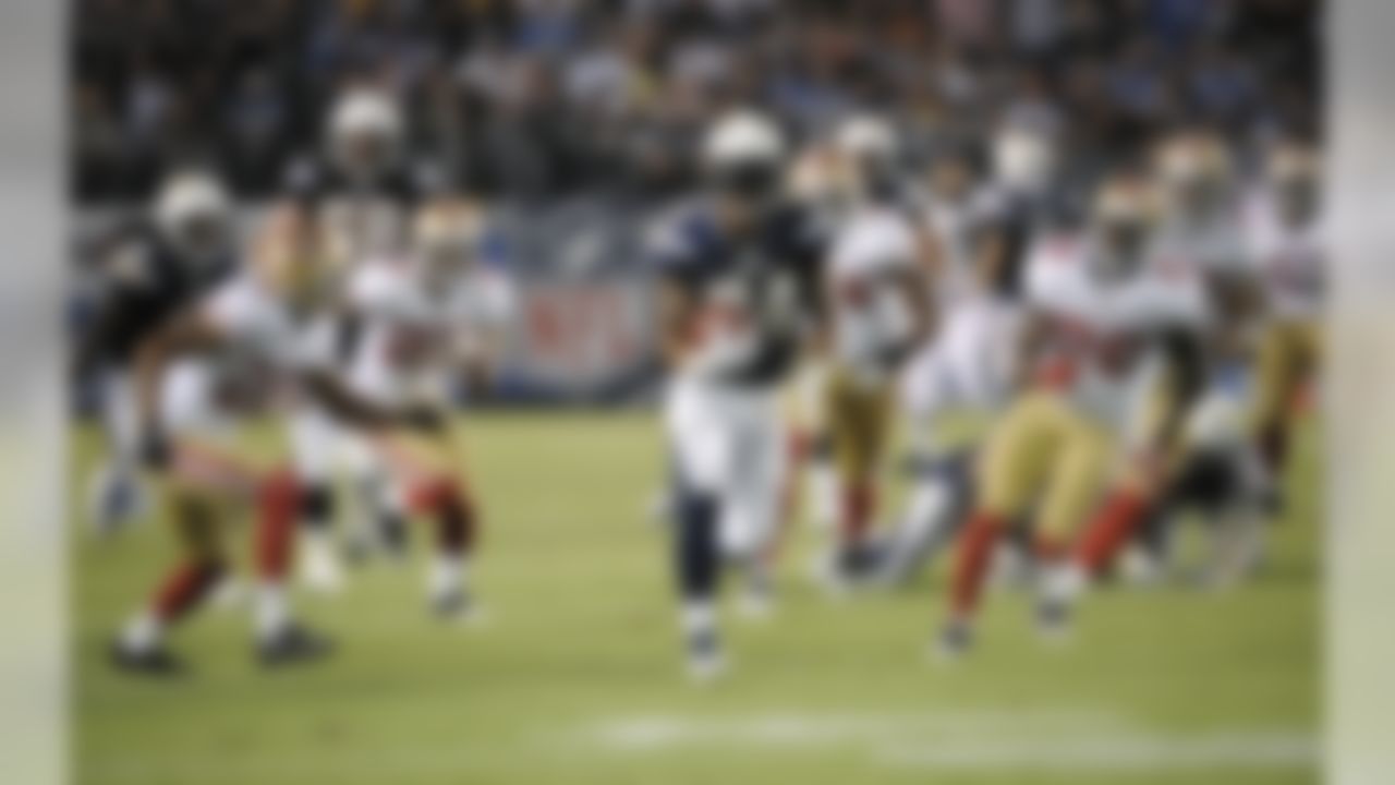 San Diego Chargers running back Ryan Mathews leaves the San Francisco 49ers' defense behind him as he scampers for a 54-yard touchdown during the first quarter of an NFL preseason football game Thursday, Sept. 1, 2011 in San Diego. (AP Photo/Denis Poroy)