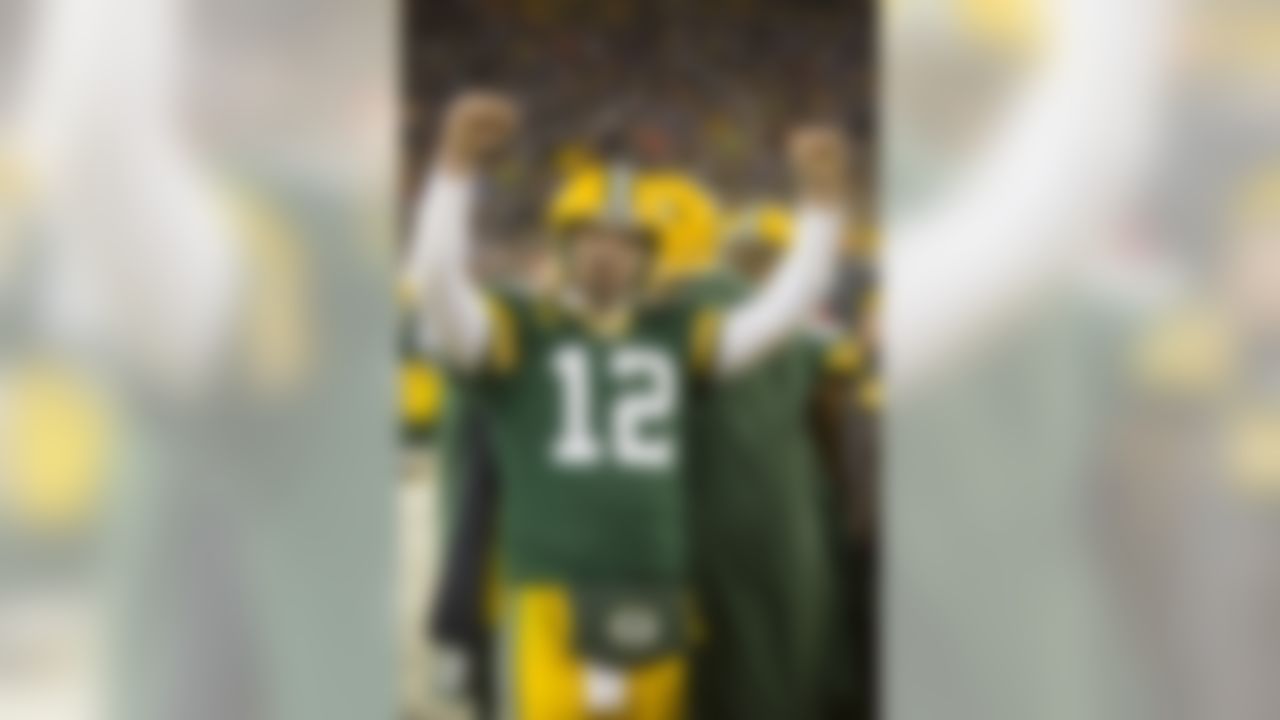 Green Bay Packers quarterback Aaron Rodgers (12) gestures as Lions fail to score late in the fourth quarter  at Lambeau Field in Green Bay, WI on December 28, 2014. The Packers beat the Lions 30-20  (Todd Rosenberg/NFL)
