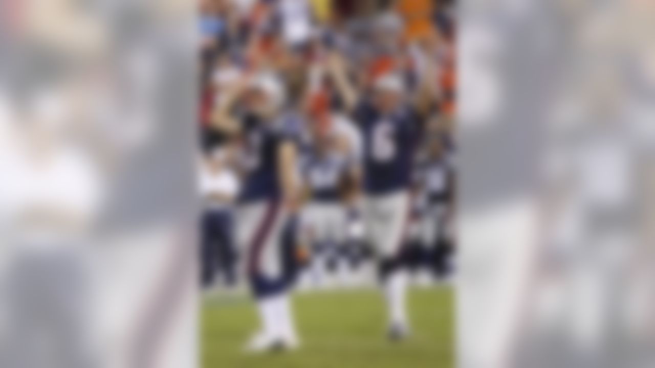 New England Patriots kicker Stephen Gostkowski (3) and holder Chris Hanson (6) celebrate after Gostkowski kicked the go-ahead field goal with eight seconds remaining in a preseason NFL football game, Friday, Aug. 28, 2009, in Landover, Md. The Patriots won 27-24. (AP Photo/Pablo Martinez Monsivais)