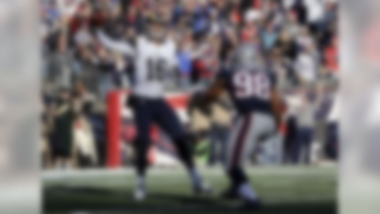 Los Angeles Rams quarterback Jared Goff (16) passes against the rush by New England Patriots defensive lineman Trey Flowers (98) during the first half of an NFL football game, Sunday, Dec. 4, 2016, in Foxborough, Mass. (AP Photo/Steven Senne)