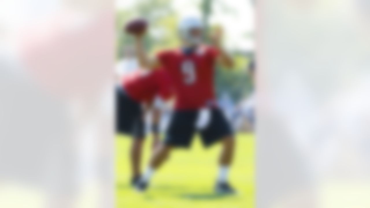 Detroit Lions quarterback Matthew Stafford (9) passes during NFL football training camp at the team's practice facility in Allen Park, Mich., Saturday, July 30, 2011. (AP Photo/Rick Osentoski)