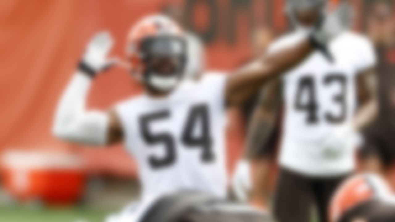 Cleveland Browns linebacker Anthony Walker signals a penalty against the offense during NFL football practice at the team's training facility, Wednesday, June 9, 2021, in Berea, Ohio.