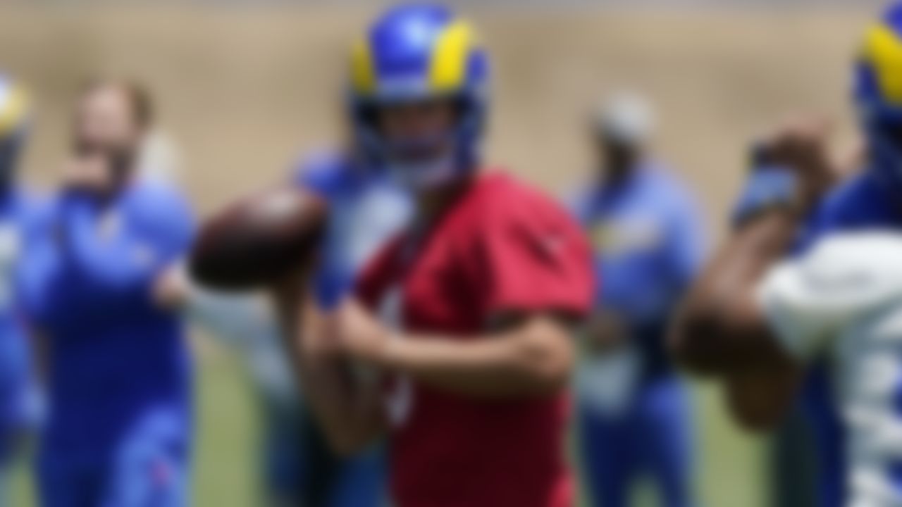 Los Angeles Rams quarterback Matthew Stafford fakes a pass during an NFL football practice Tuesday, June 8, 2021, in Thousand Oaks, Calif.