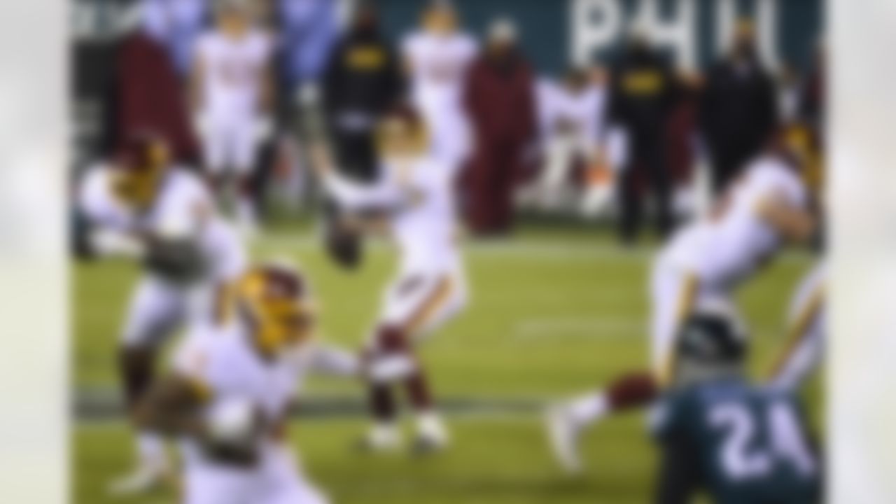 Washington Football Team's Alex Smith passes during the first half of an NFL football game against the Philadelphia Eagles, Sunday, Jan. 3, 2021, in Philadelphia, Pennsylvania.