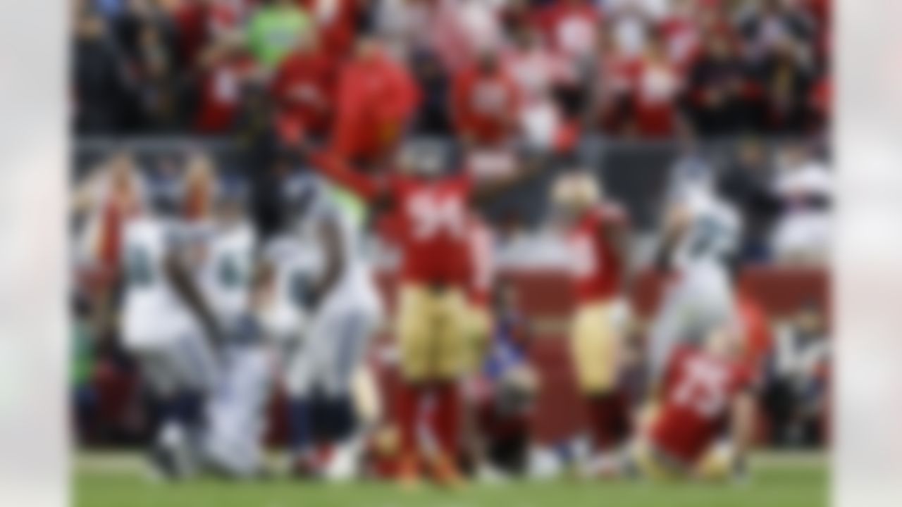San Francisco 49ers defensive end Charles Omenihu (94) celebrates during the second half of an NFL wild card playoff football game against the Seattle Seahawks in Santa Clara, Calif., Saturday, Jan. 14, 2023. The 49ers won 41-23.
