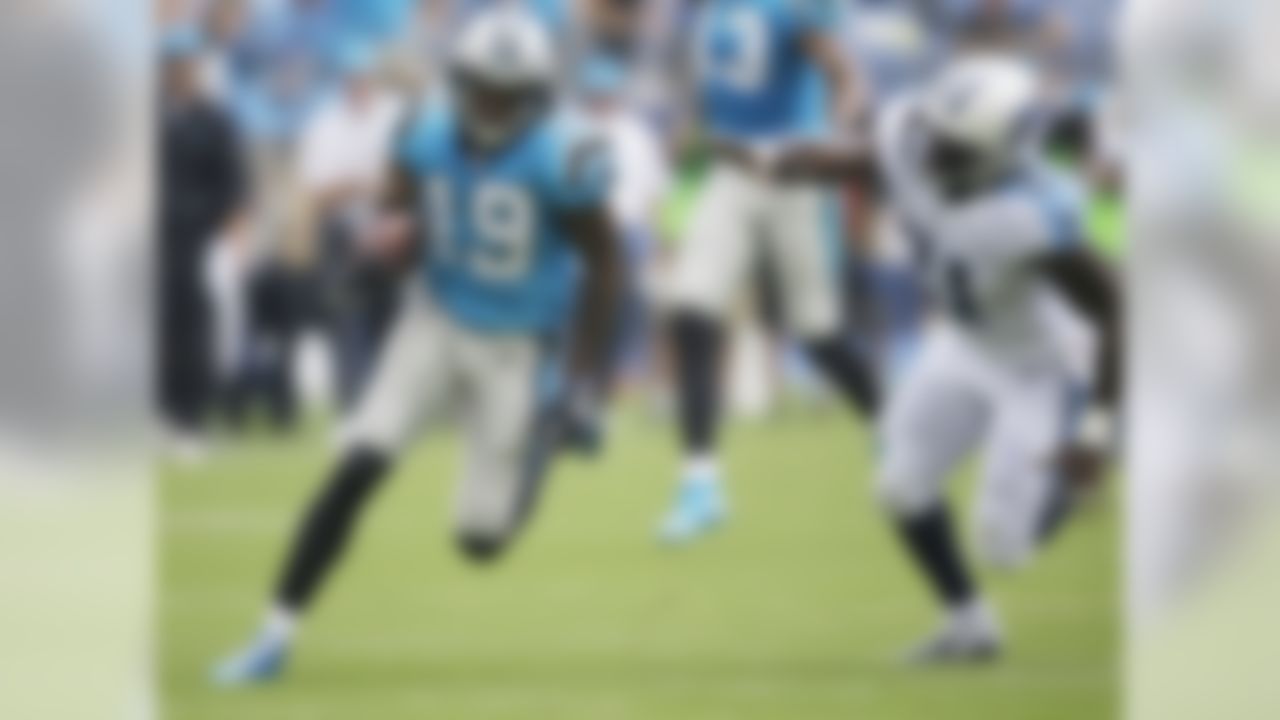 Carolina Panthers wide receiver Ted Ginn (19) moves past Tennessee Titans strong safety Da'Norris Searcy (21) the first half of an NFL preseason football game, Saturday, Aug. 20, 2016, in Nashville, Tenn. Finn scored a touchdown on the play. (AP Photo/James Kenney)