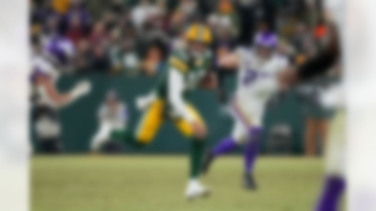 Green Bay Packers quarterback Jordan Love (10) runs the ball during an NFL football game against the Minnesota Vikings on Sunday, January 2, 2022 in Green Bay, Wisconsin.