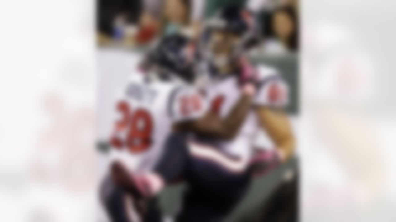 Houston Texans tight end Owen Daniels (81) celebrates a touchdown catch with running back Justin Forsett (28) during the first half of an NFL football game against the New York Jets, Monday, Oct. 8, 2012, in East Rutherford, N.J. (AP Photo/Kathy Willens)