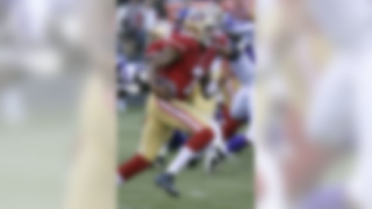 San Francisco 49ers quarterback Colin Kaepernick runs for a touchdown against the Minnesota Vikings during the second quarter of an NFL preseason football game in San Francisco, Friday, Aug. 10, 2012. (AP Photo/Paul Sakuma)
